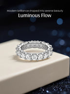 Own Your Bloom Full Eternity Ring displayed with glowing background, representing refined artistry and modern glamour, Boston.
