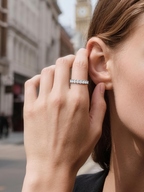 Own Your Bloom Full Eternity Diamond Band Ring worn by woman in chic outfit, showcasing refined grace and brilliance, Miami.