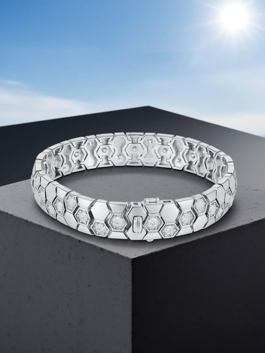 Own Your Bloom 14K honeycomb bracelet under sunlight, reflecting geometric beauty and timeless shine, Miami.