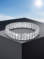 Own Your Bloom 14K honeycomb bracelet under sunlight, reflecting geometric beauty and timeless shine, Miami.
