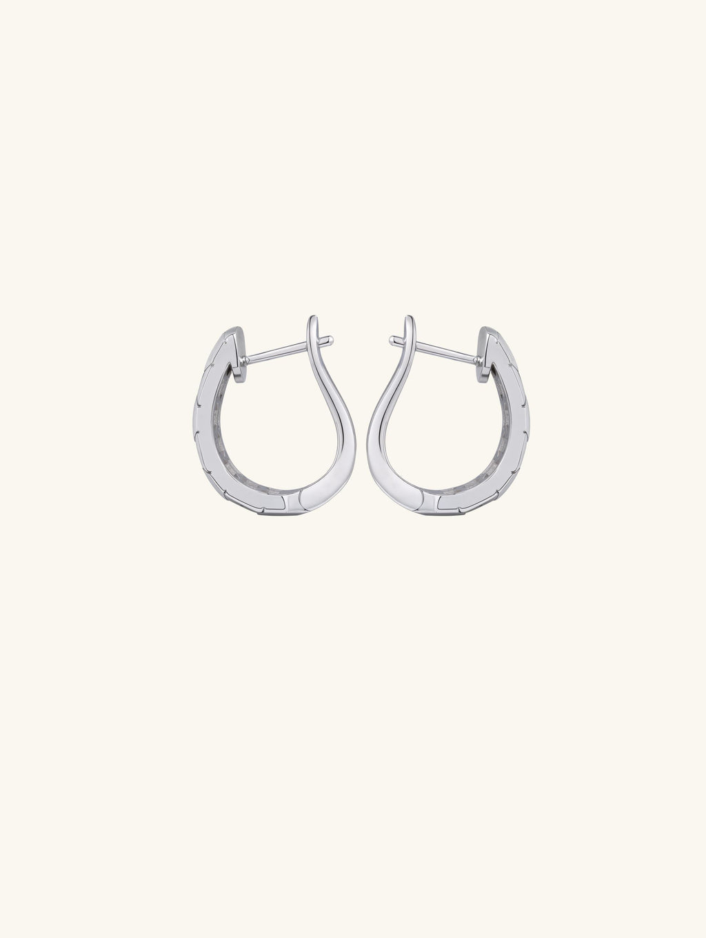 Own Your Bloom hexagon silver hoop diamond earrings close-up showing craftsmanship and contemporary elegance, Chicago.