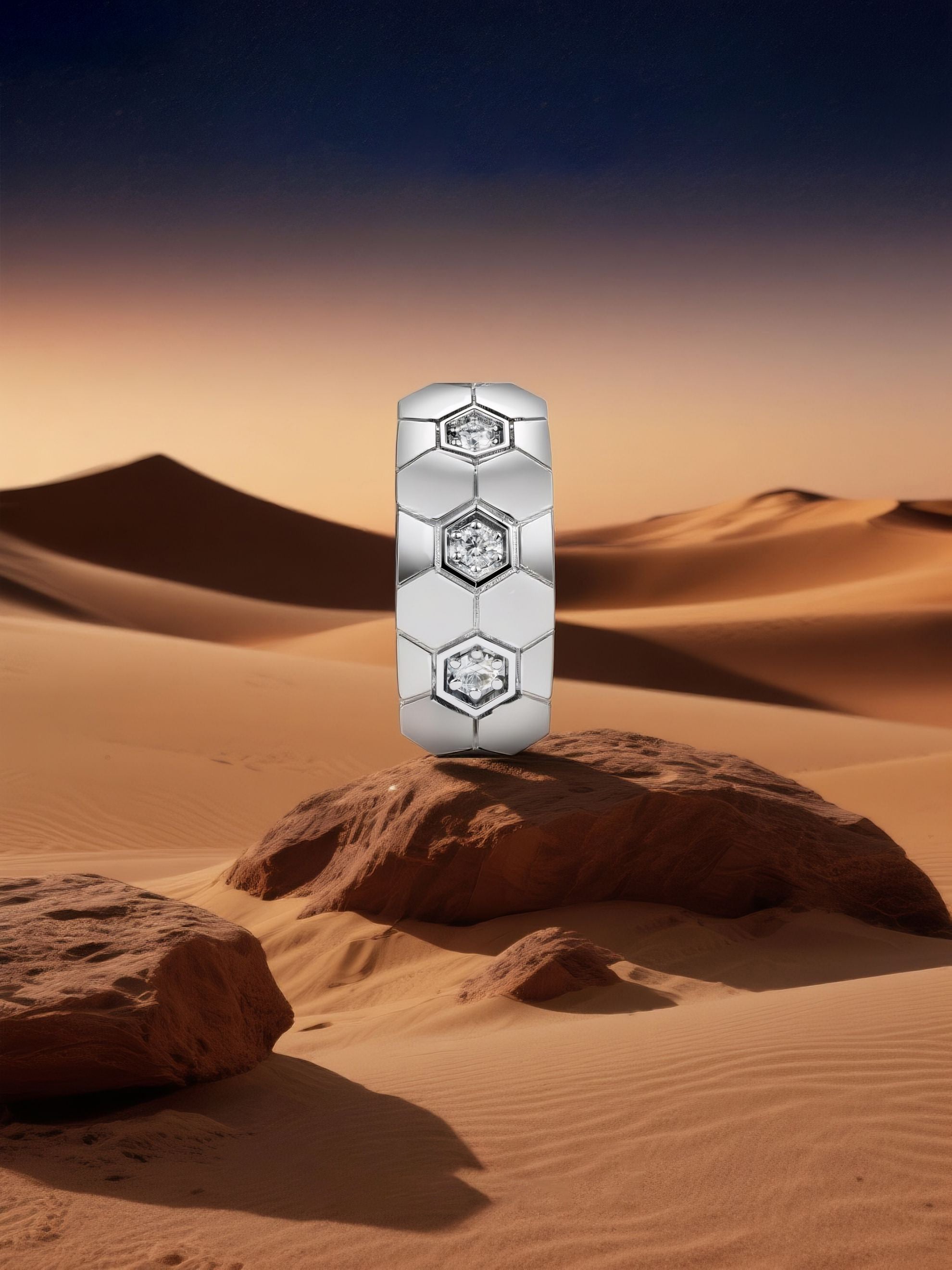 Own Your Bloom hexagon silver diamond earrings displayed against desert landscape background, symbolizing strength and brilliance, Miami.