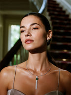 Own Your Bloom green gemstone tassel necklace on woman indoors, refined modern look with luxury gemstone brilliance, Los Angeles.
