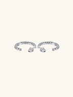 Own Your Bloom moissanite half hoop earrings side angle highlighting modern structure and sparkling stones, luxury fine jewelry, Los Angeles.