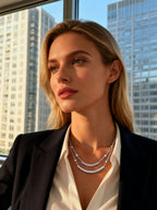 Own Your Bloom Layered Crystal Necklace worn by woman in office setting, radiating sophistication and confidence, New York.