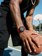 Own Your Bloom men’s 304SS skeleton watch on man’s wrist walking on basketball court, lifestyle street-sport look, Atlanta.