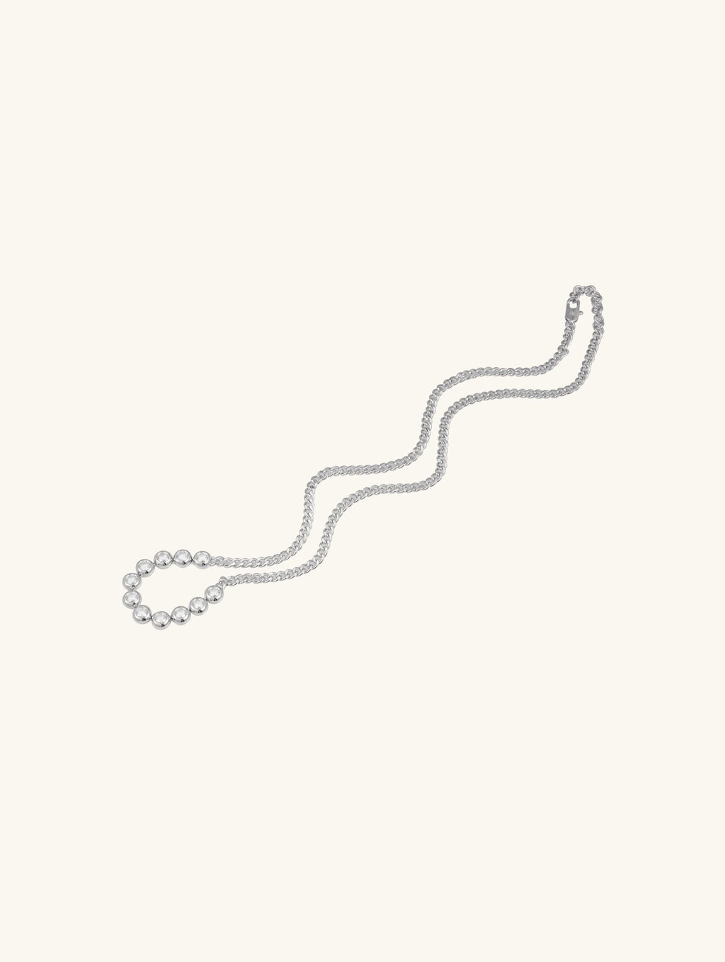 Own Your Bloom minimalist silver bezel moissanite necklace close-up showing brilliance and fine setting, Chicago.