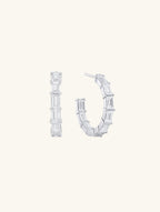 Own Your Bloom moissanite baguette hoop earrings front view in white gold, elegant rectangular-cut stones with timeless brilliance, New York.