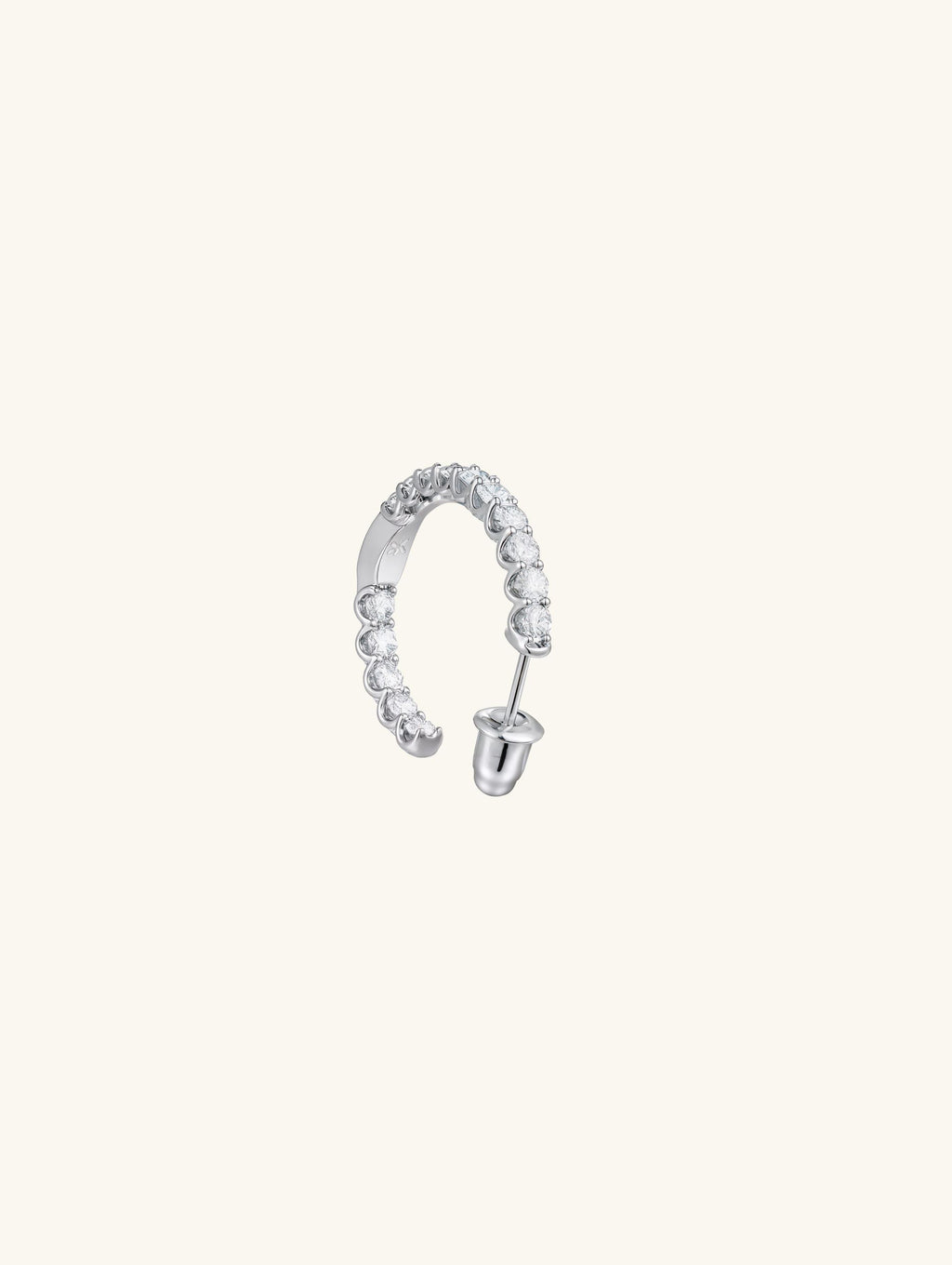 Own Your Bloom half hoop moissanite diamond earrings detailed view with open curve setting and reflective shine, contemporary style, Chicago.