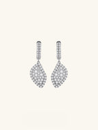 Own Your Bloom moissanite radiant drape drop earrings front view in white gold, showcasing leaf-inspired shape and cascading brilliance, New York.