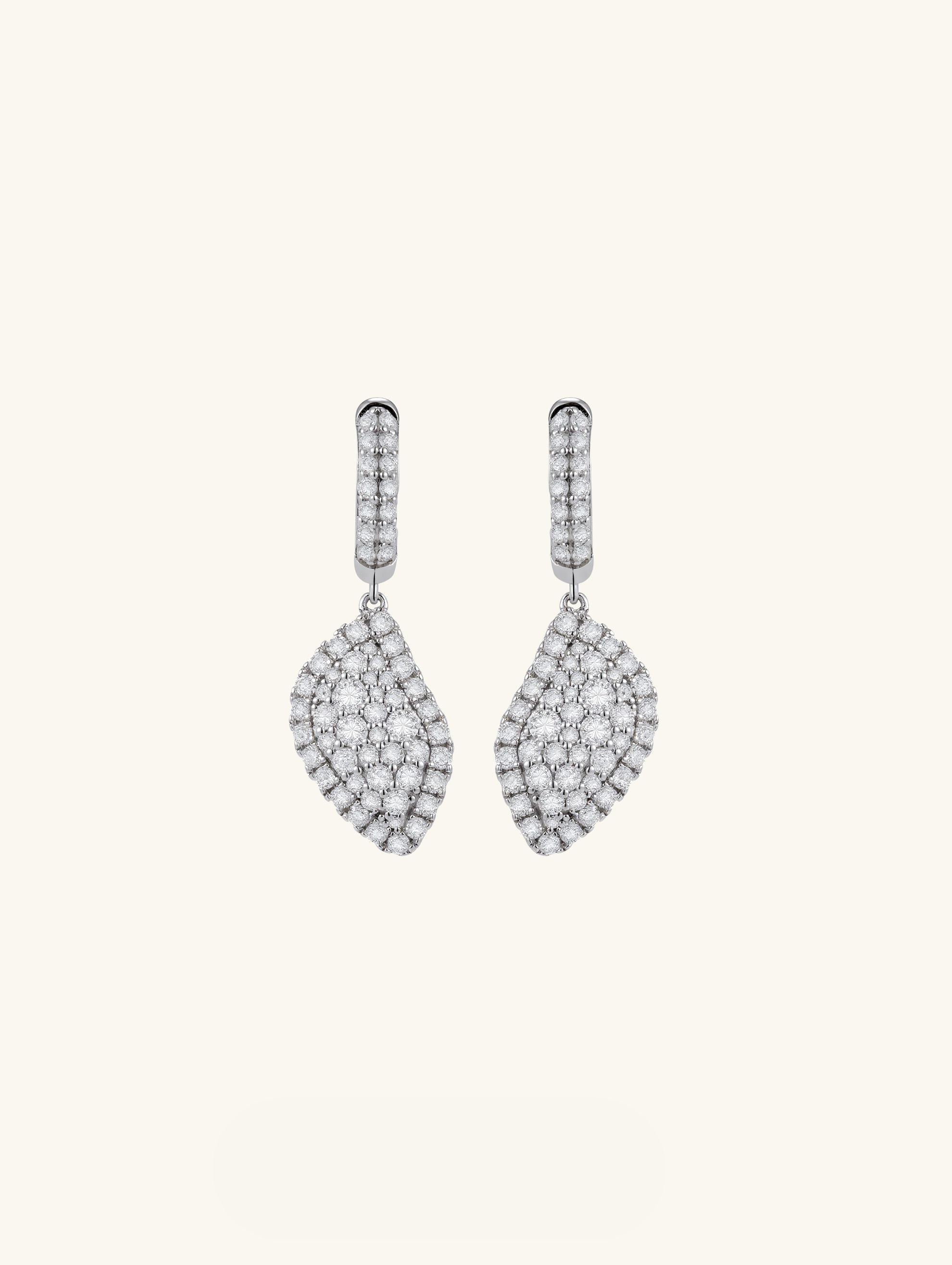 Own Your Bloom moissanite radiant drape drop earrings front view in white gold, showcasing leaf-inspired shape and cascading brilliance, New York.