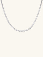 Own Your Bloom moissanite tennis necklace front view featuring round-cut stones in white gold, classic brilliance and refined luxury, New York.