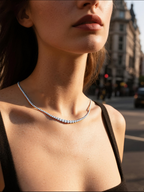 Own Your Bloom moissanite tennis necklace on woman styled with minimal black dress, radiant feminine charm, Los Angeles.