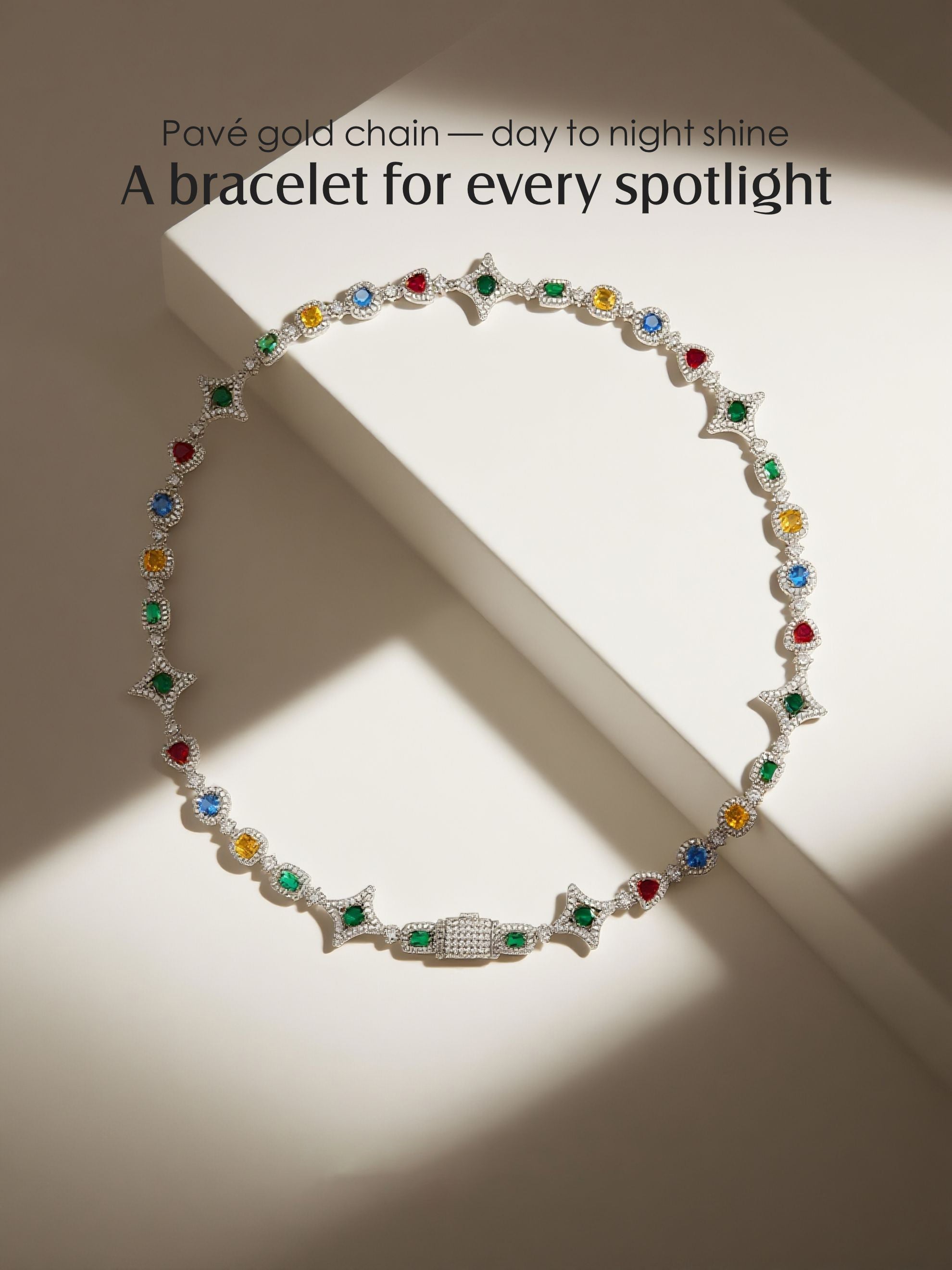 Own Your Bloom multicolor gemstone 14K gold necklace photographed with warm shadow play, Boston.