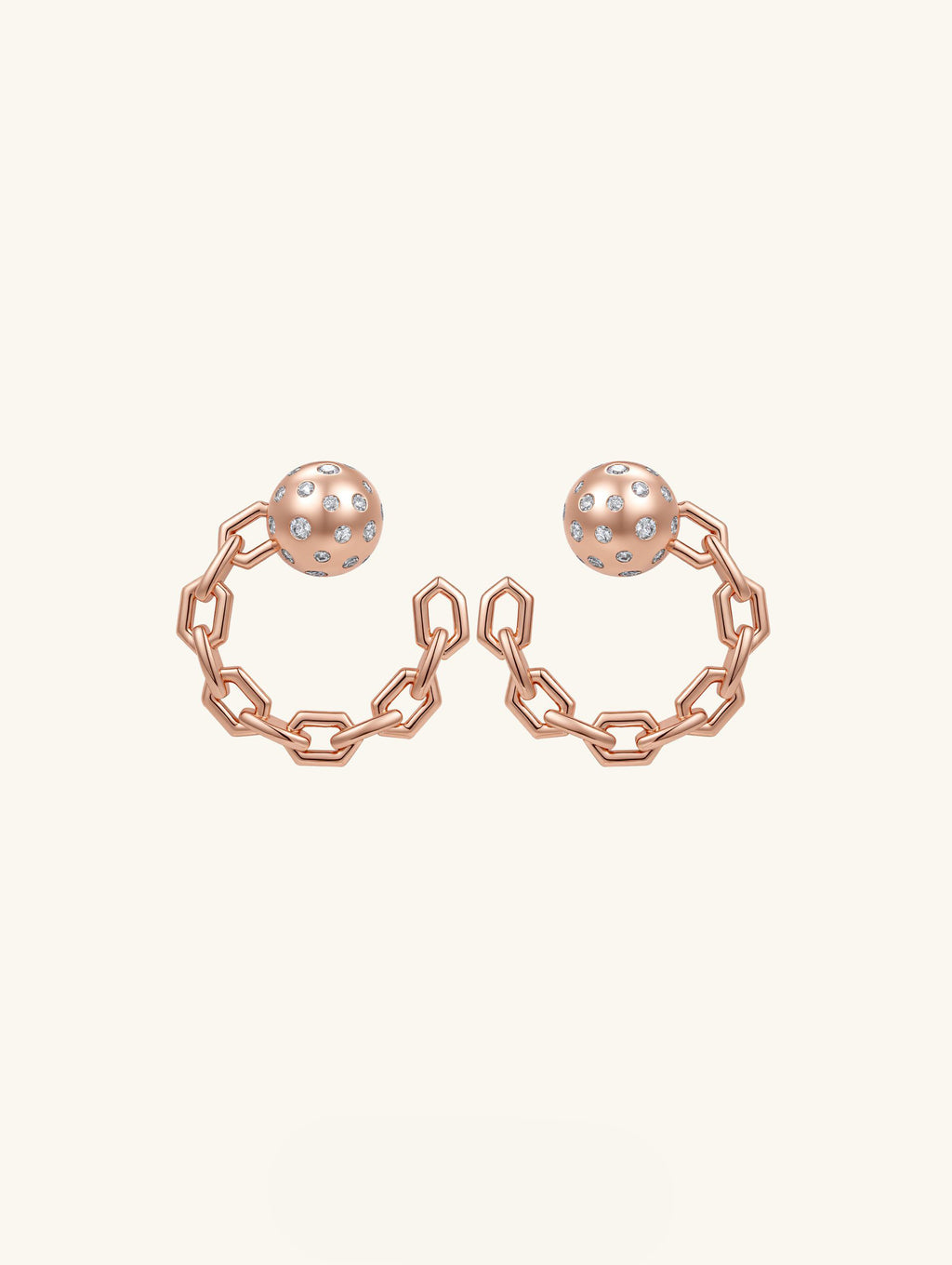 Own Your Bloom Orbit of Daring Rose Gold Crystal Chain Hoop Earrings front view showcasing geometric chain and crystal detailing, New York.