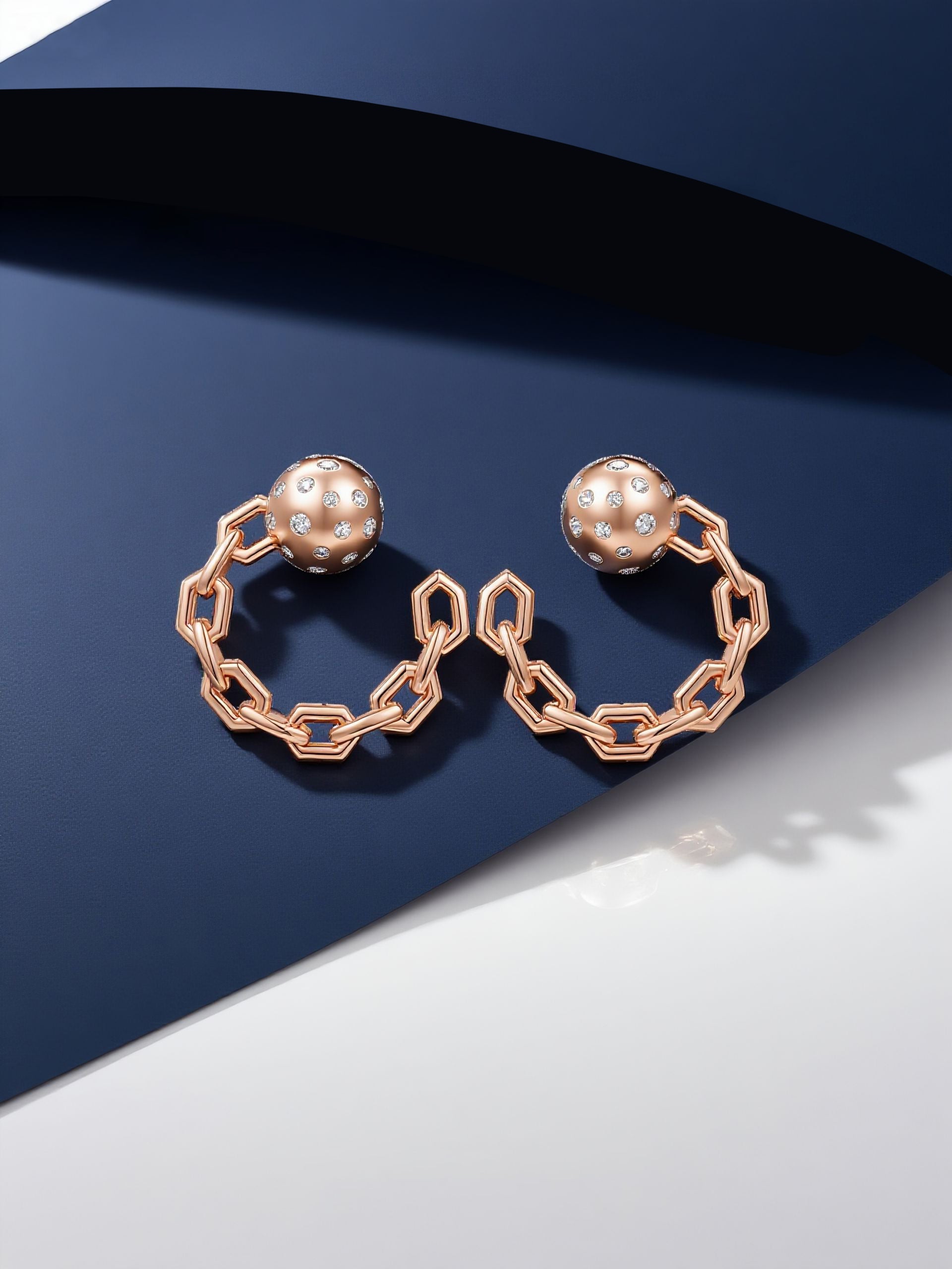 Own Your Bloom Orbit of Daring Rose Gold Earrings displayed under soft studio light with elegant geometric shadow play, Miami.