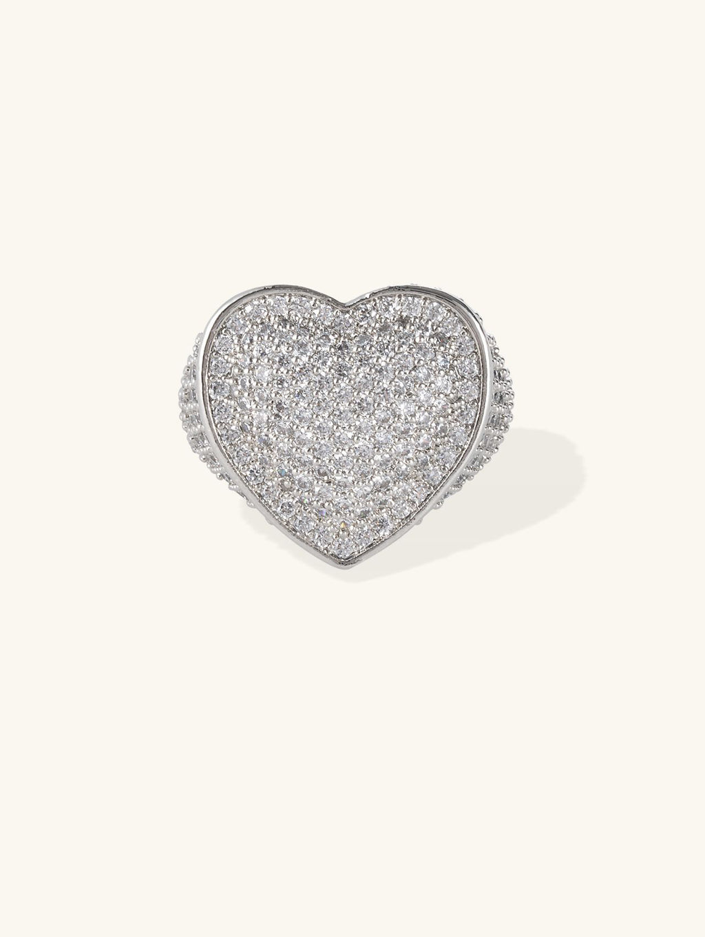 Front view of the pavé heart ring with smooth bezel edge on white background.