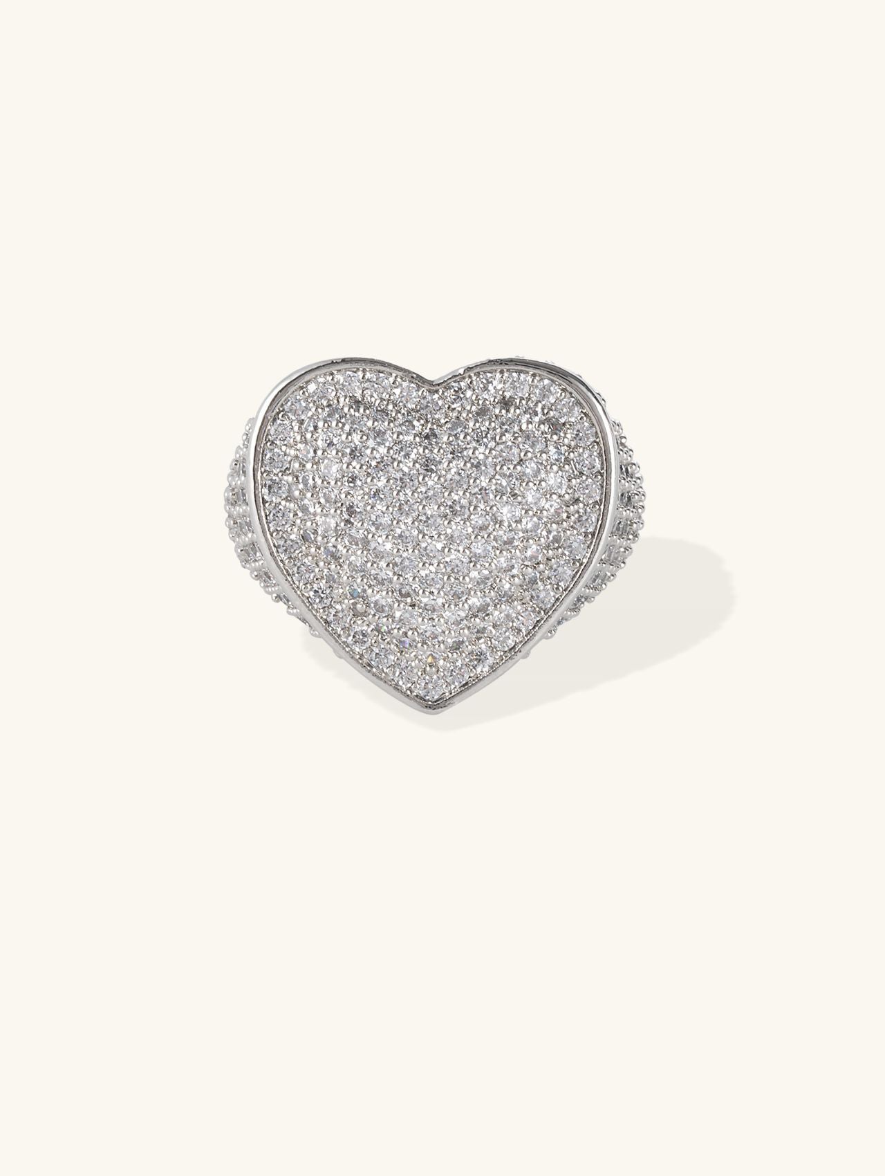 Front view of the pavé heart ring with smooth bezel edge on white background.