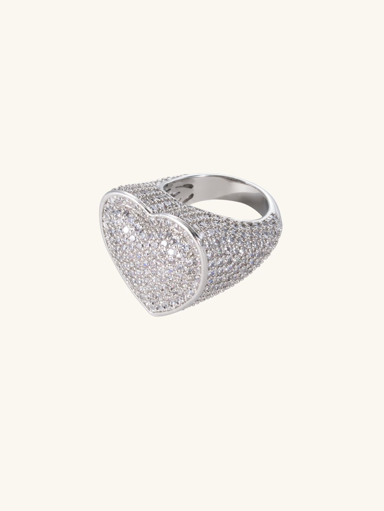 Angled view of Own Your Bloom 14K white gold–plated pavé heart ring on white background.