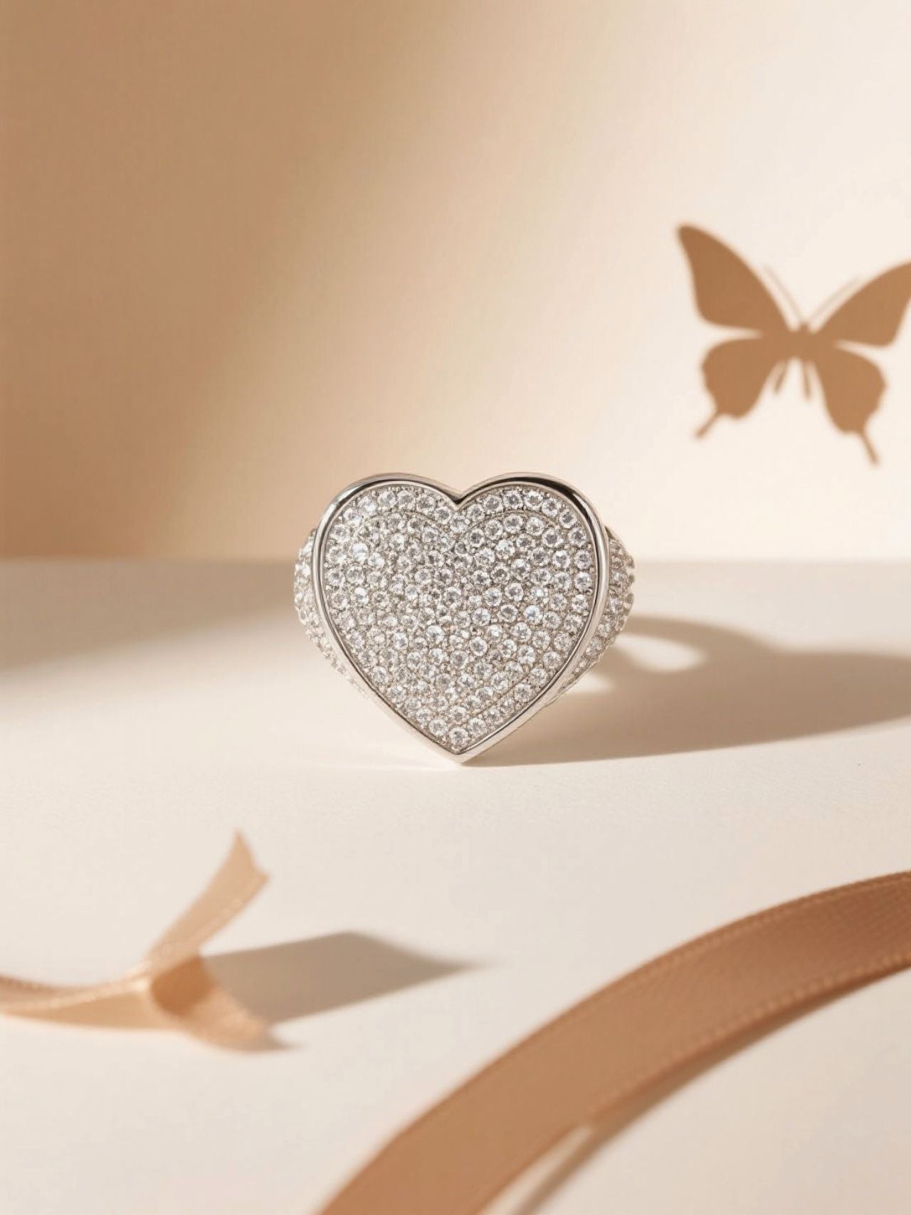 Front studio view of the Own Your Bloom pavé heart ring highlighting full pavé surface.