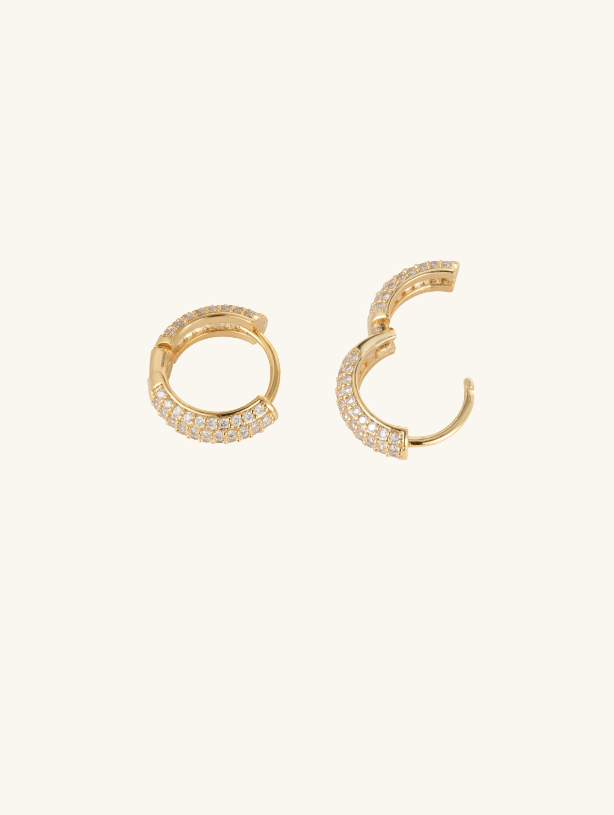 Open-hinge detail of Own Your Bloom 14K gold-plated pavé hoop earrings.