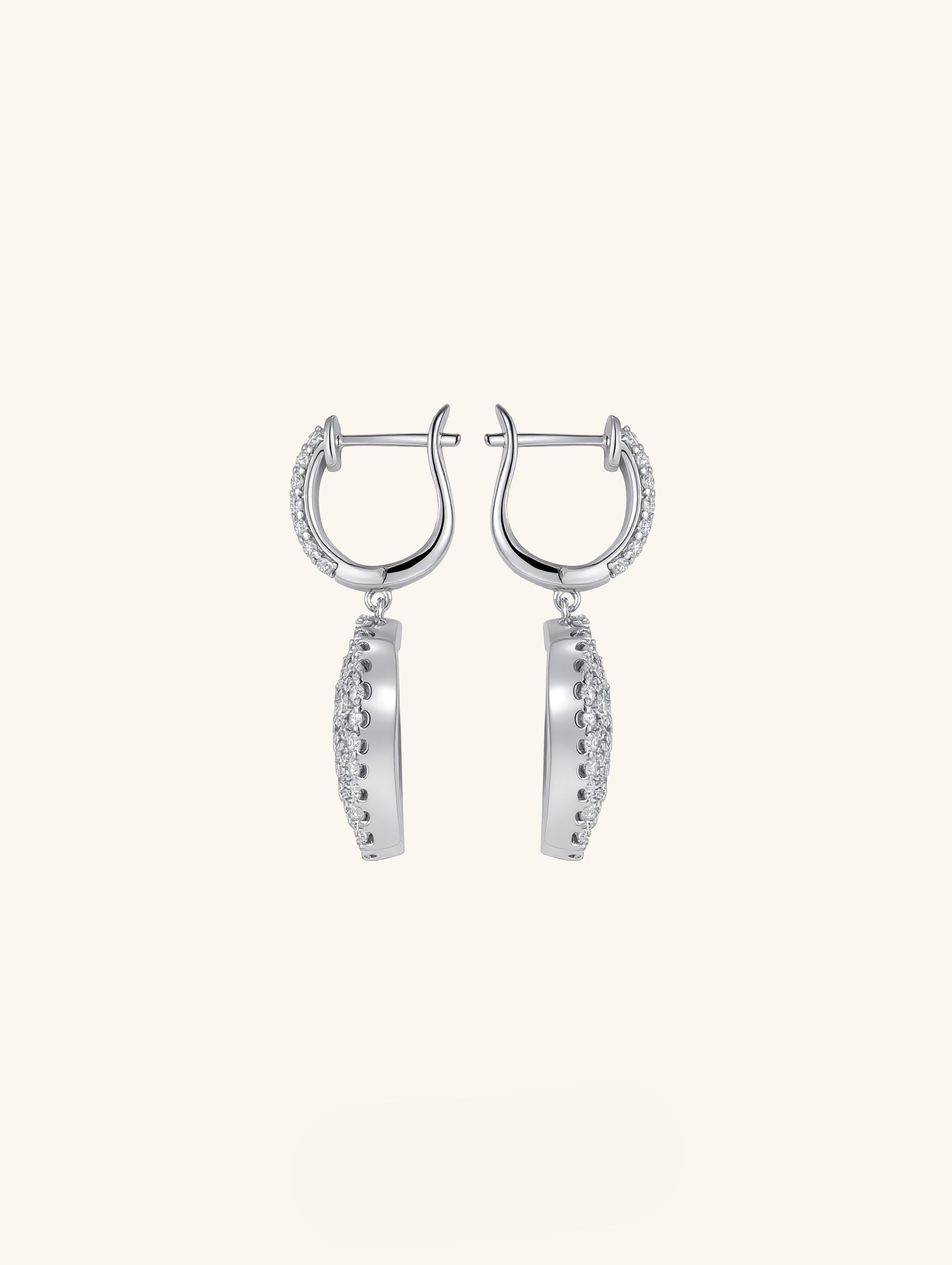 Own Your Bloom moissanite radiant drape earrings side view highlighting elegant curves and layered moissanite sparkle, luxury fine jewelry, Los Angeles.