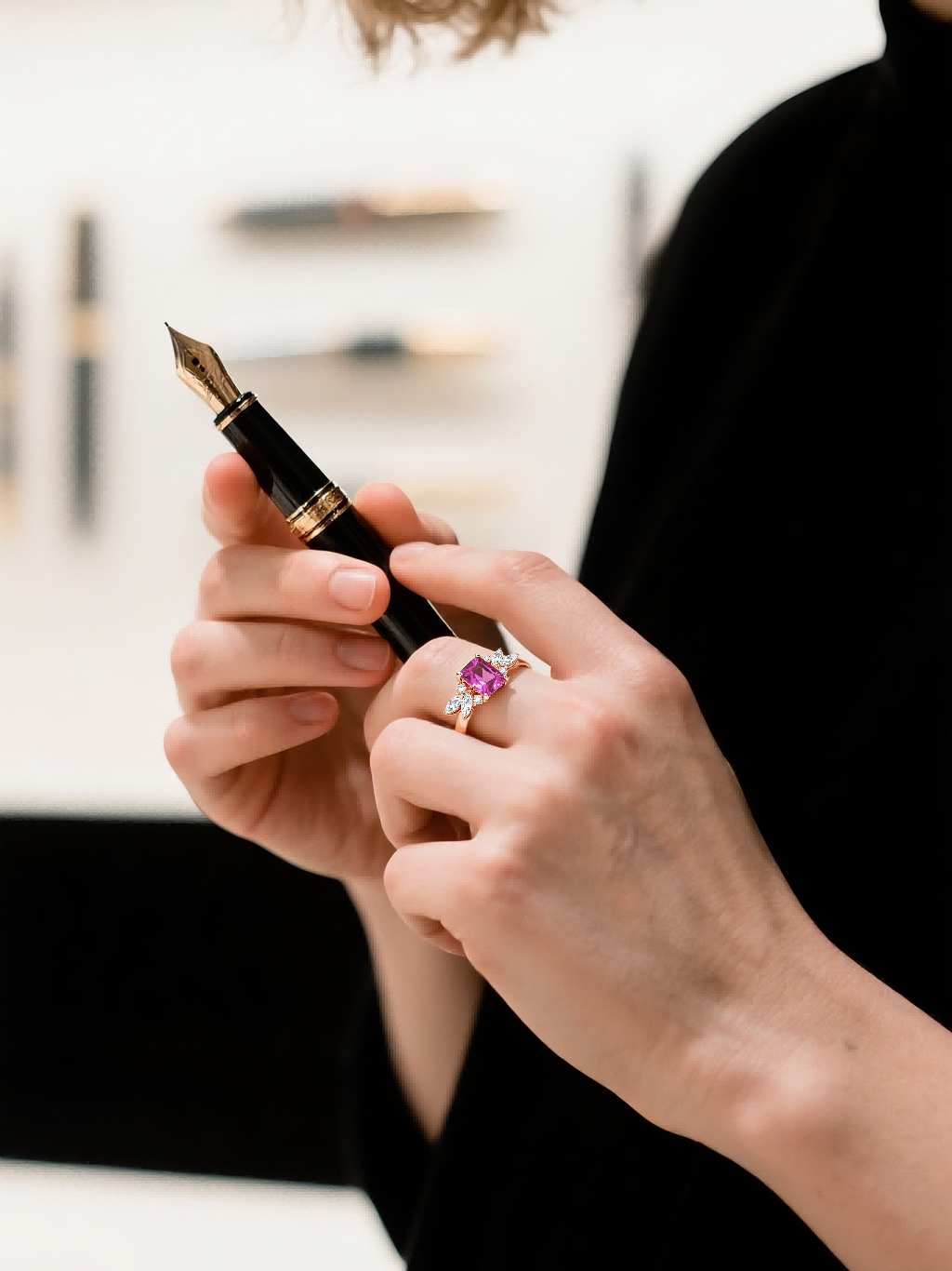 Own Your Bloom pink diamond 14K ring worn by woman in luxury interior, radiant gemstone fashion elegance, Chicago.