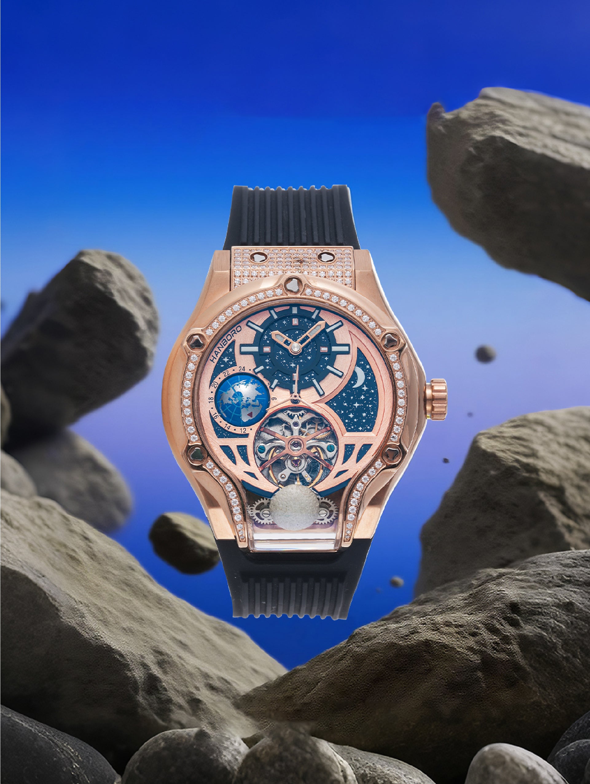 Own Your Bloom Starry Machine Rose Gold Watch displayed among dark rocks and blue background, symbolizing cosmic luxury, Miami.