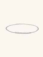 Own Your Bloom silver bezel moissanite chain necklace side view showing refined craftsmanship and shine, luxury jewelry, Los Angeles.