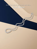 Own Your Bloom silver bezel diamond-style moissanite necklace displayed under soft warm light, modern fine jewelry, Boston.