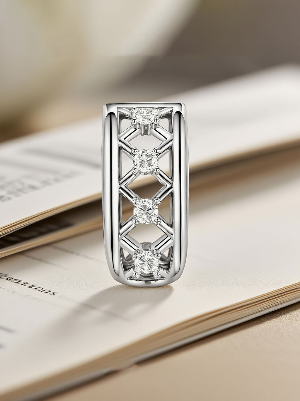 Own Your Bloom silver lattice diamond hoop earrings standing upright on textured paper background, elegant fine jewelry, Boston.