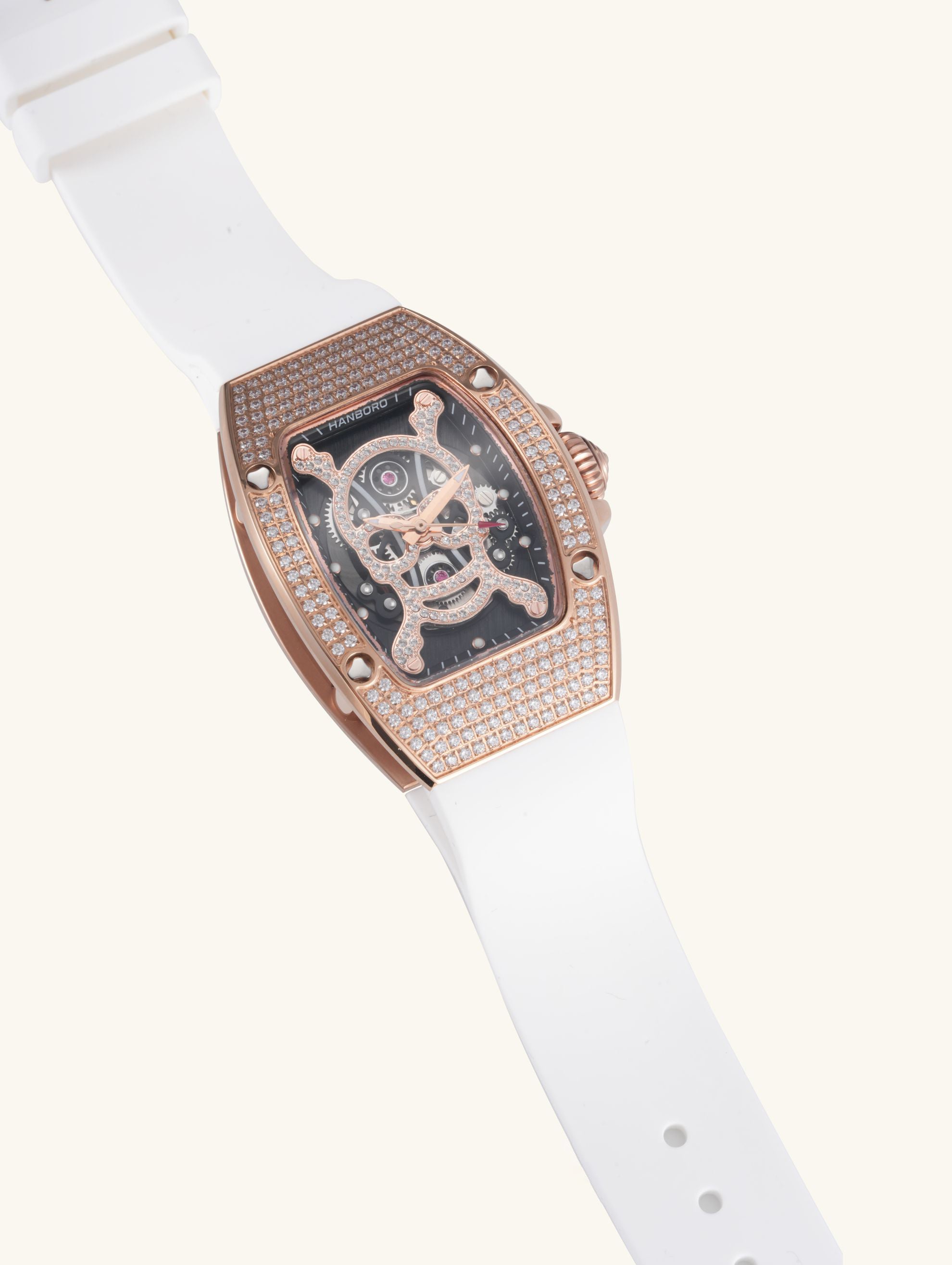Own Your Bloom luxury skull diamond quartz movement women’s wristwatch with white band, elegant product angle, San Francisco.