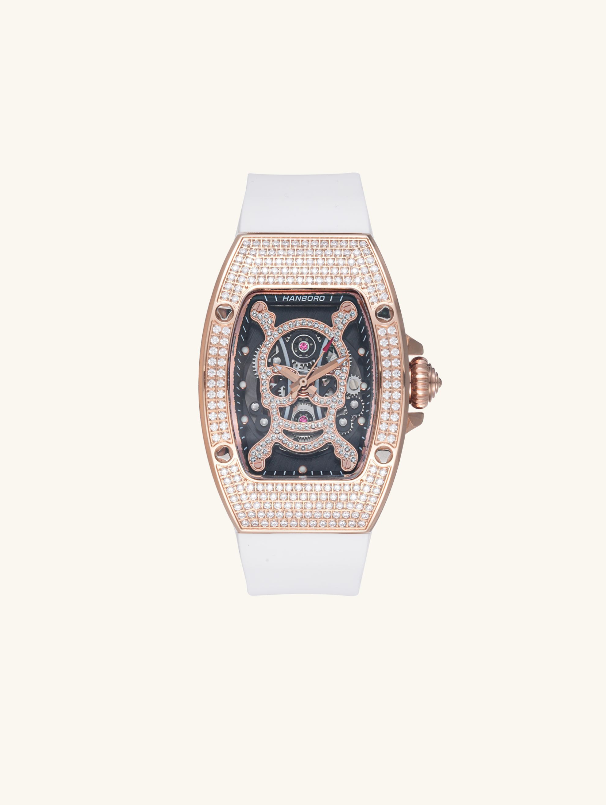 Own Your Bloom skull diamond quartz women’s watch front view, rose gold case with white strap and crystal details, New York.