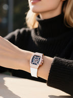 Own Your Bloom skull diamond quartz luxury women’s watch worn by woman outdoors in daylight, Houston.