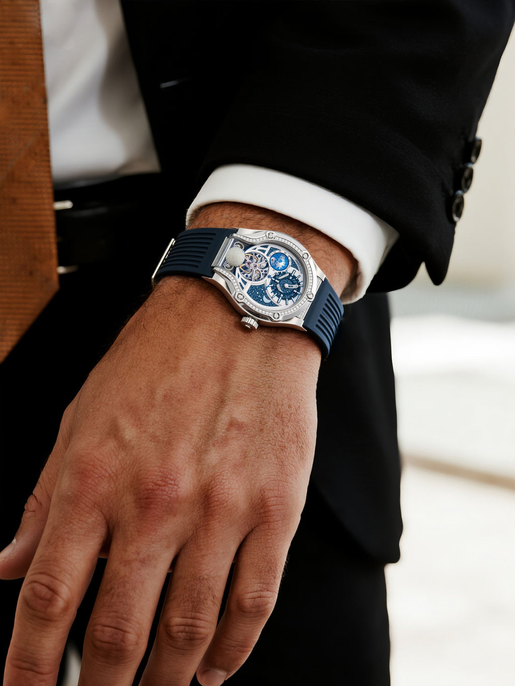 Own Your Bloom Starry Machine silver watch on man’s wrist carrying briefcase, commute scene, Dallas.