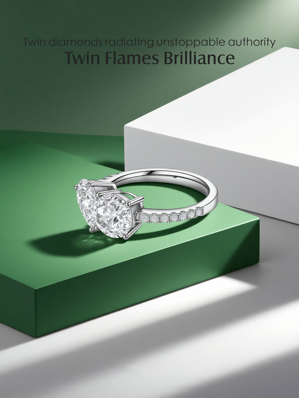 Own Your Bloom white gold two stone Toi et Moi diamond ring displayed under elegant studio lighting with shadows, Dallas.