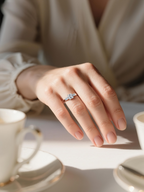 Own Your Bloom large emerald-cut 14K diamond ring on luxury surface, refined modern jewelry composition, San Diego.