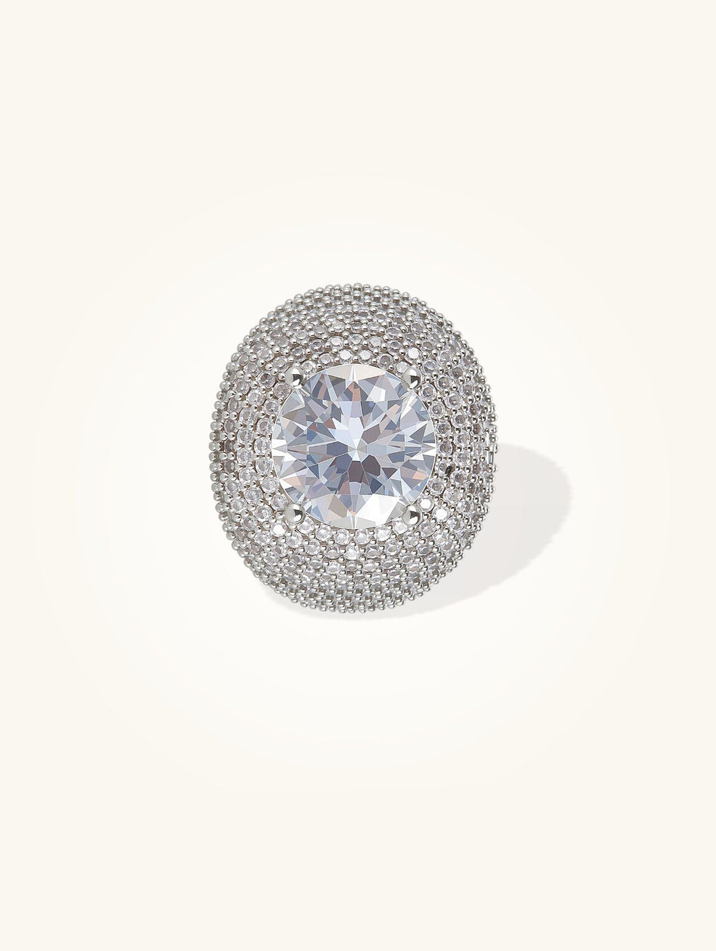 Own Your Bloom 14K white gold–plated wide-band pavé ring with round center stone, front view on white background.