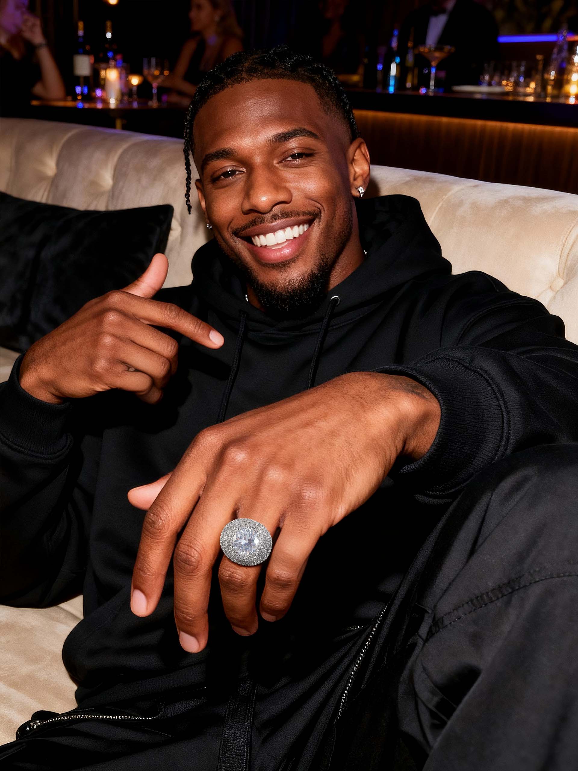 Male model wearing Own Your Bloom 14K white gold–plated wide-band pavé ring, on-hand lifestyle shot.