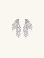 Own Your Bloom Willow Leaf Diamond 14k stud earrings front and back view on a clean white background, Miami.