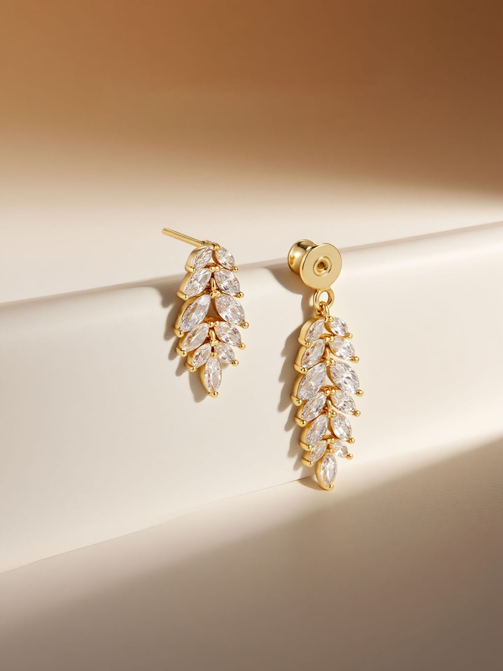 Own Your Bloom Willow Leaf Diamond 14k stud earrings in warm light lifestyle scene, Boston.