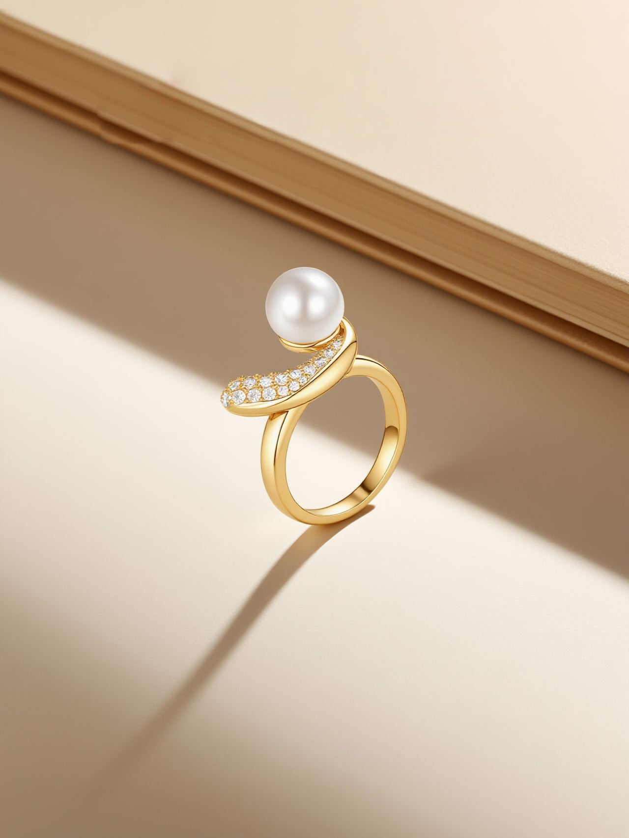 Own Your Bloom pearl diamond ring lifestyle still on warm gradient backdrop, Radiance in Motion theme, Miami FL