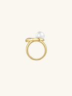 Side profile of Own Your Bloom Australian white shell pearl and diamond ring on white, elegant open design, Chicago IL